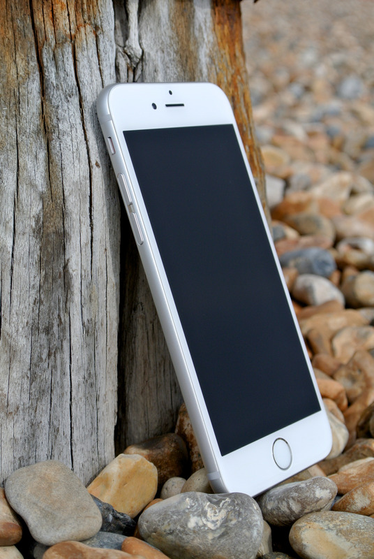 苹果手机石头手机细胞智能手机岩石鹅卵石电子设备卵石触屏图片