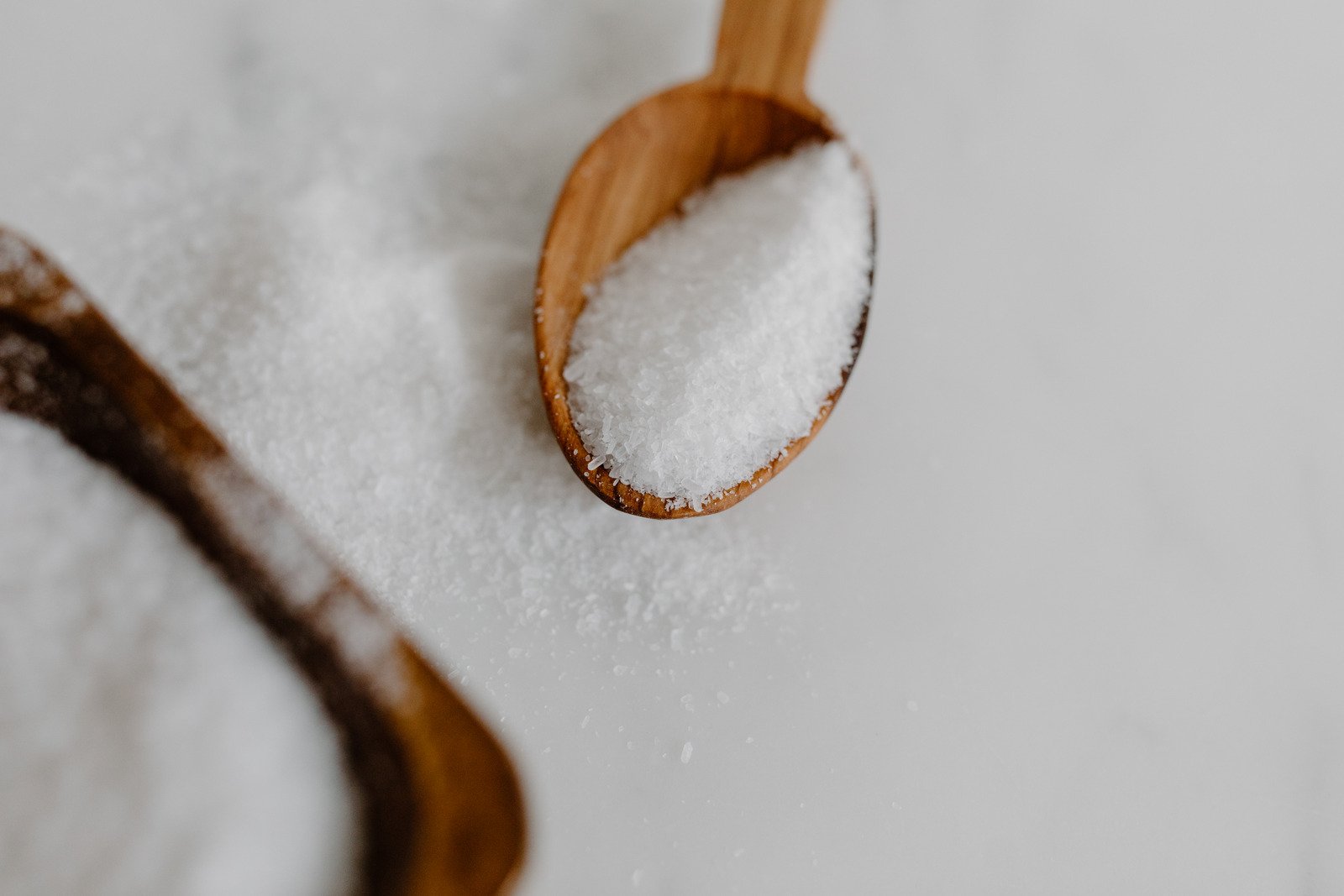 a bath salt on a wooden spoon